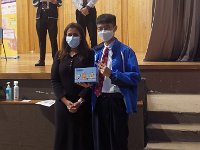 Leung Ka Hang receiving the Best Debater award